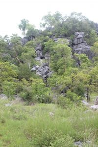 A Flying fox wire extends from a rocky outcrop at the site of the upcoming Bungaru Men's Group Camp site